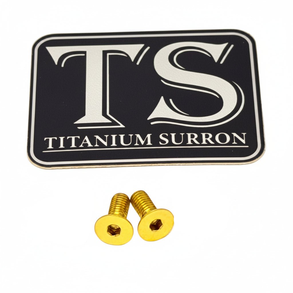 Titanium Ultra Bee brake reservoir cap bolts, gold, pair of 2 (1 brake) with Titanium Surron logo