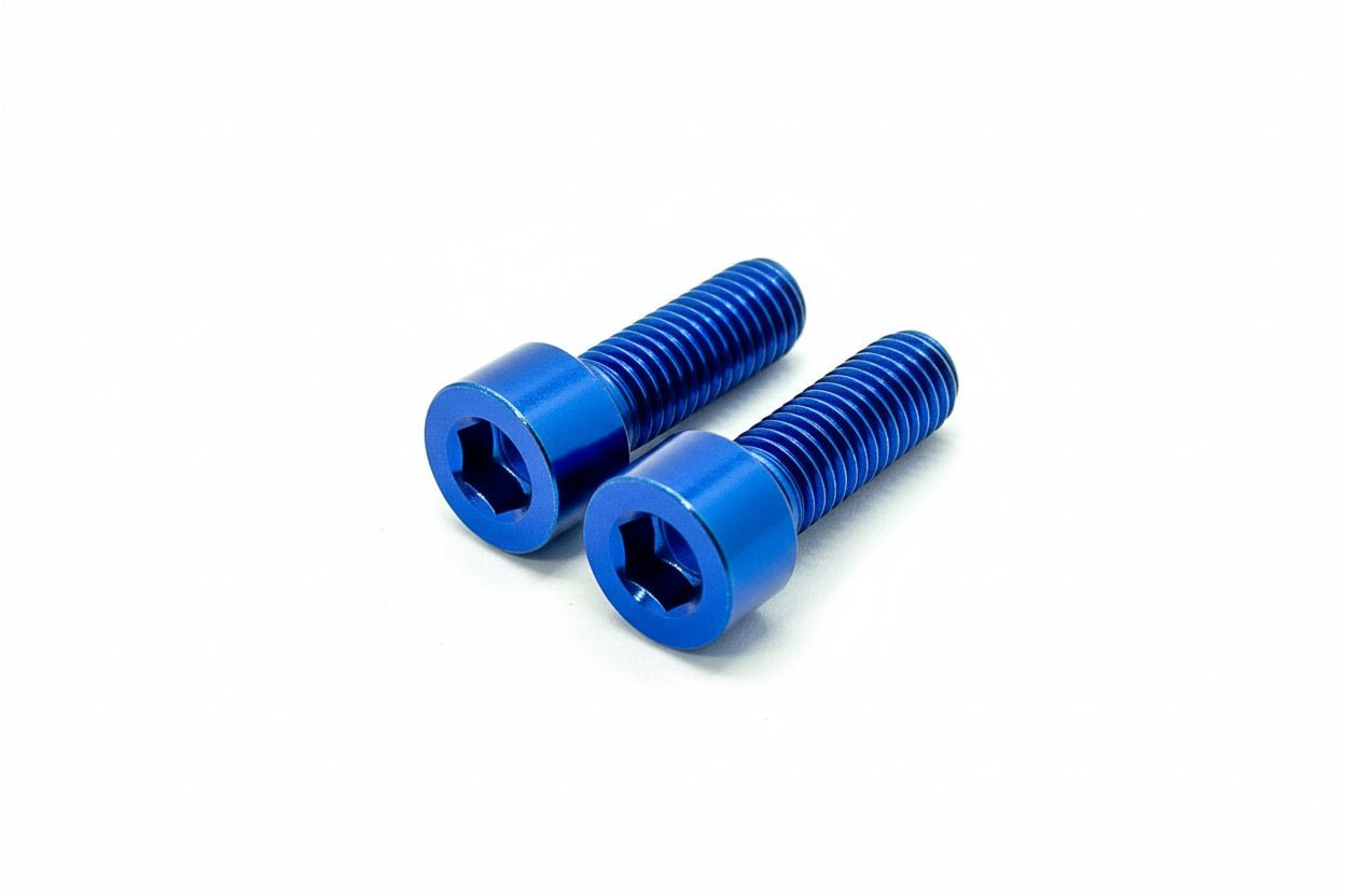 Titanium front caliper bolts for Surron Ultra Bee.