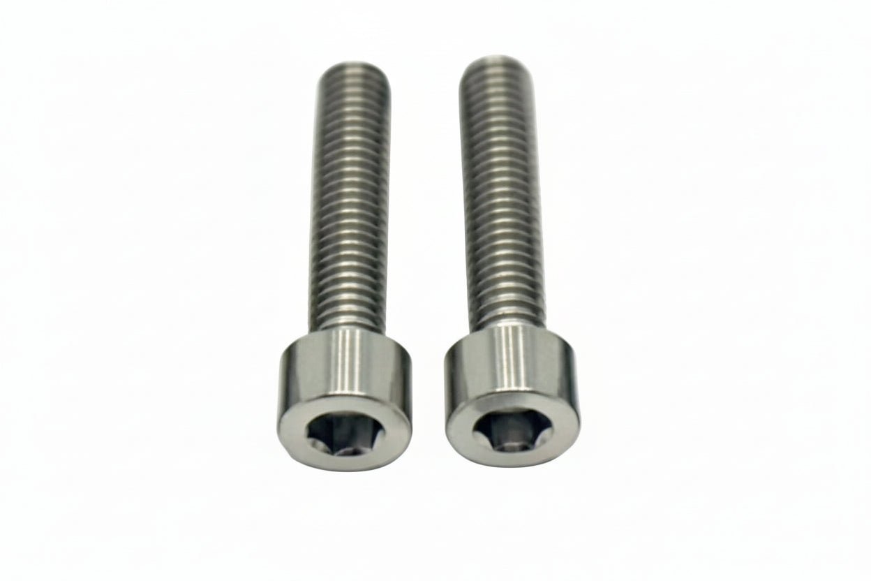 Titanium front caliper bolts for Surron Ultra Bee.